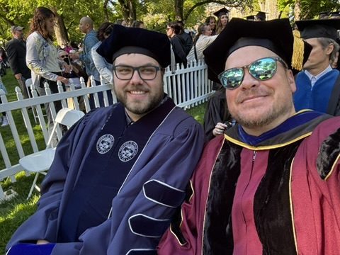 Prof. Jeffrey and a new Ph.D. in doctoral robes